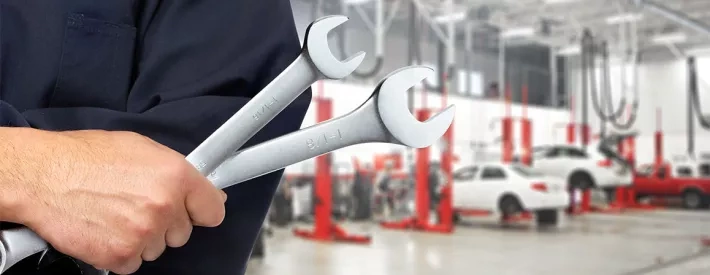 man holding spanner