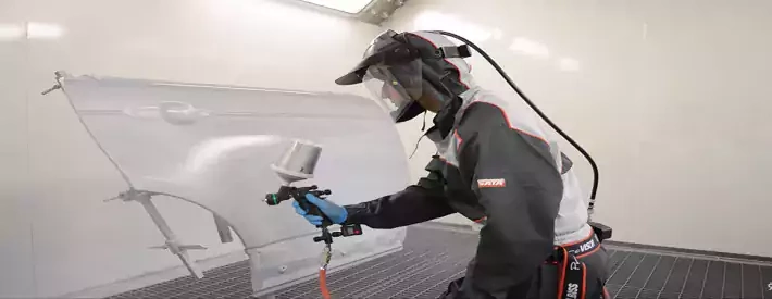 Man spraying thing