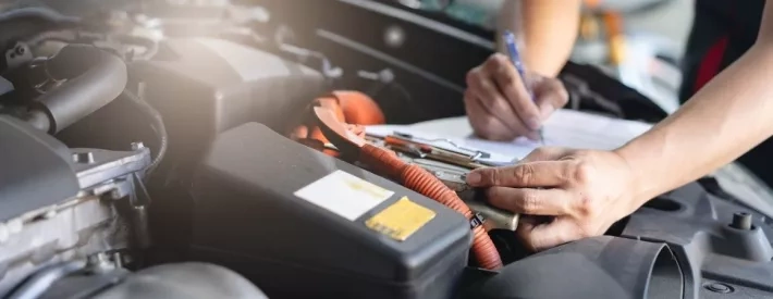 Technician holding clipboard